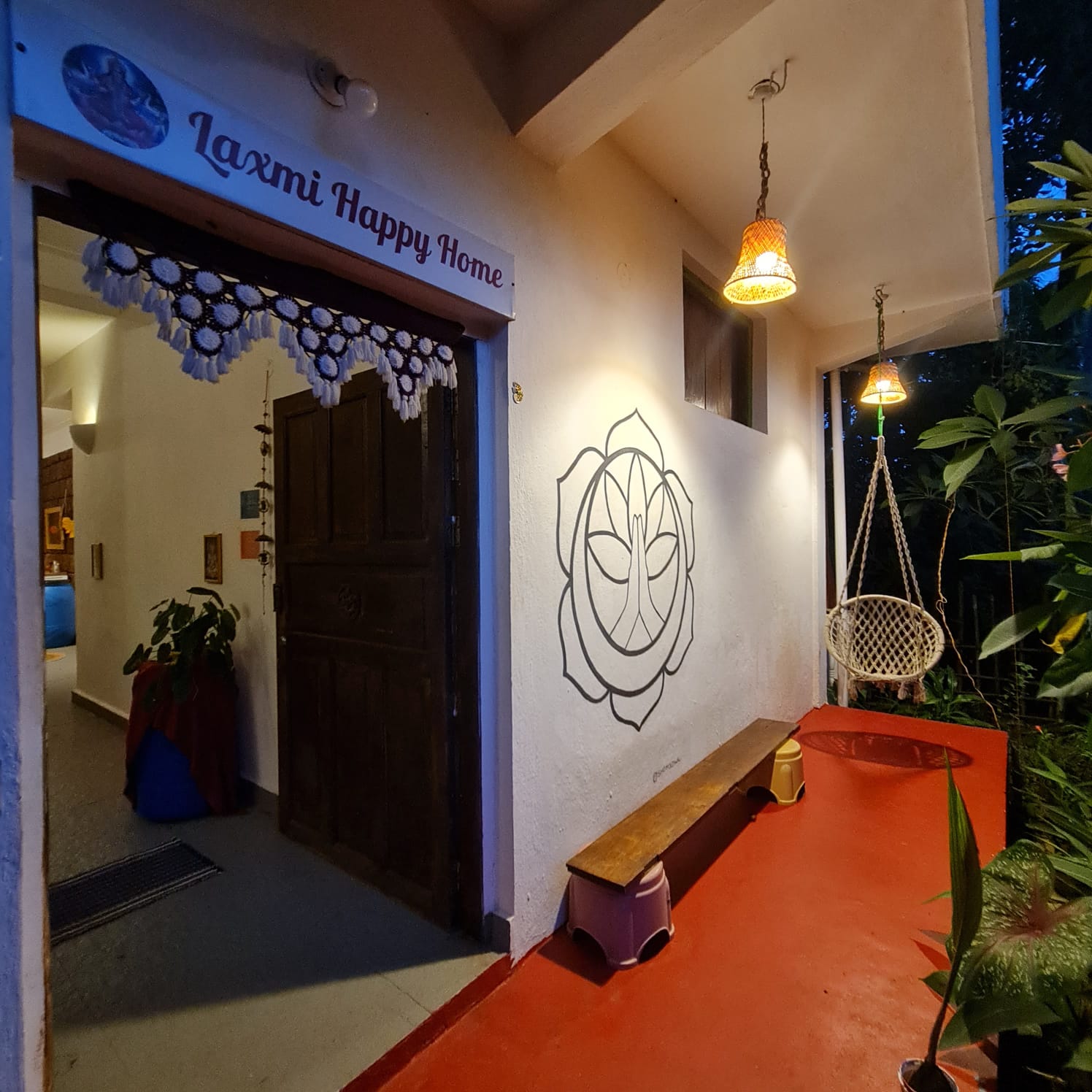 Our main entrance and hanging chair in the evening